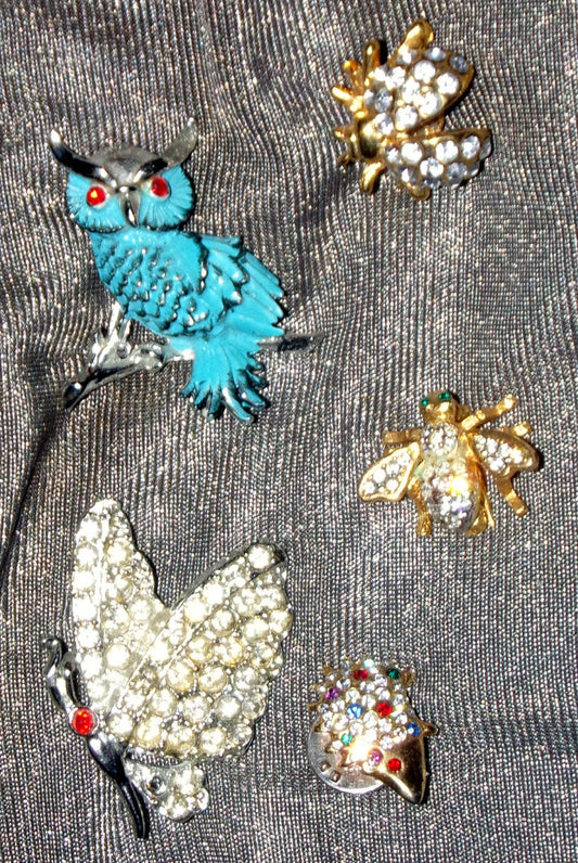 Leto's Brooches